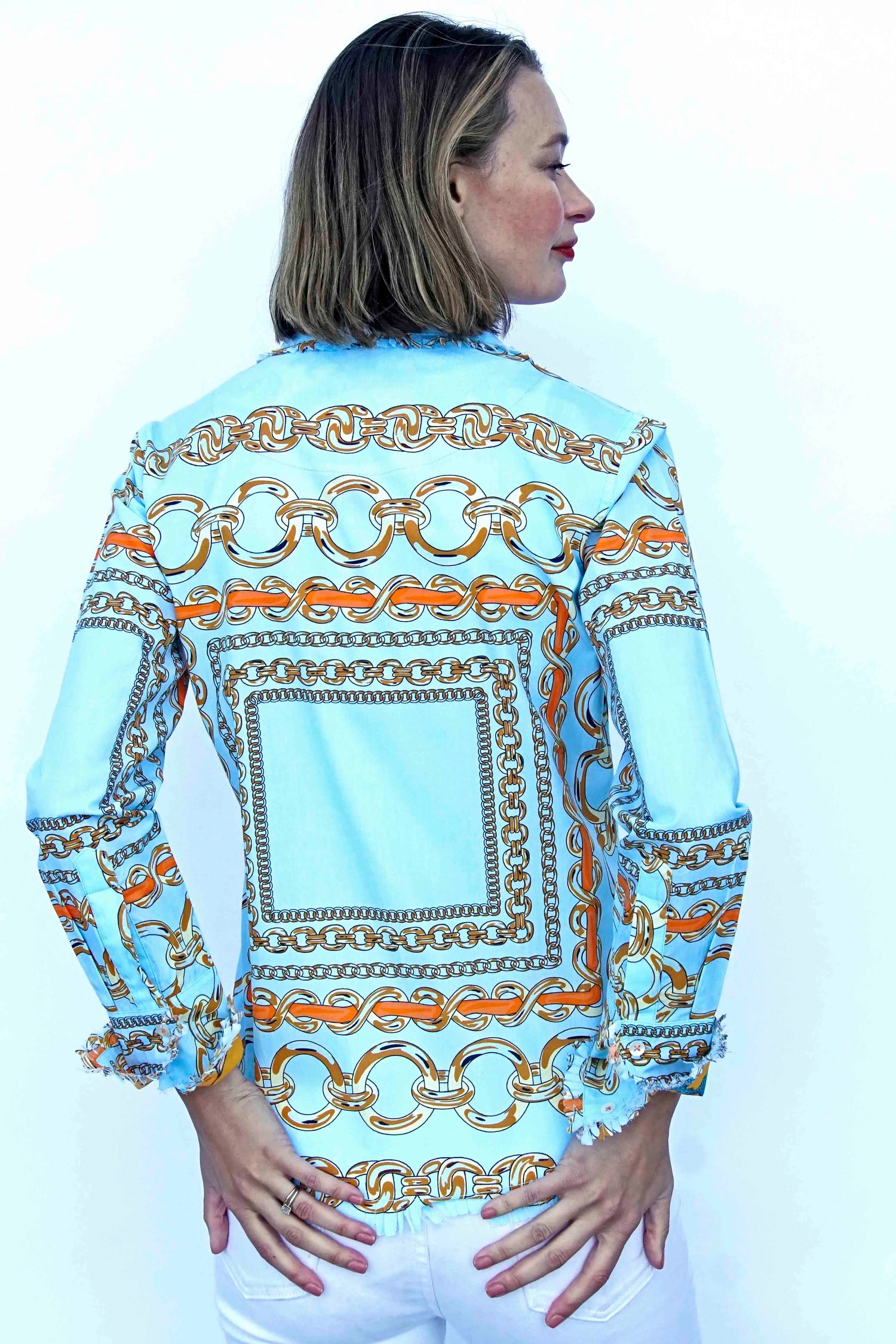 Dizzy-Lizzie Cape Cod Aqua Ground Tunic with orange link pattern, lightweight fabric, casual fit, and vibrant design.