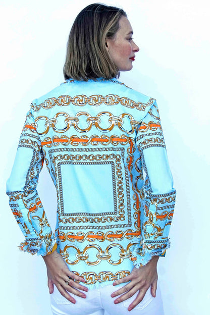Dizzy-Lizzie Cape Cod Aqua Ground Tunic with orange link pattern, lightweight fabric, casual fit, and vibrant design.