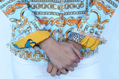Dizzy-Lizzie Cape Cod Tunic in aqua ground fabric with orange link pattern, lightweight and stylish women&