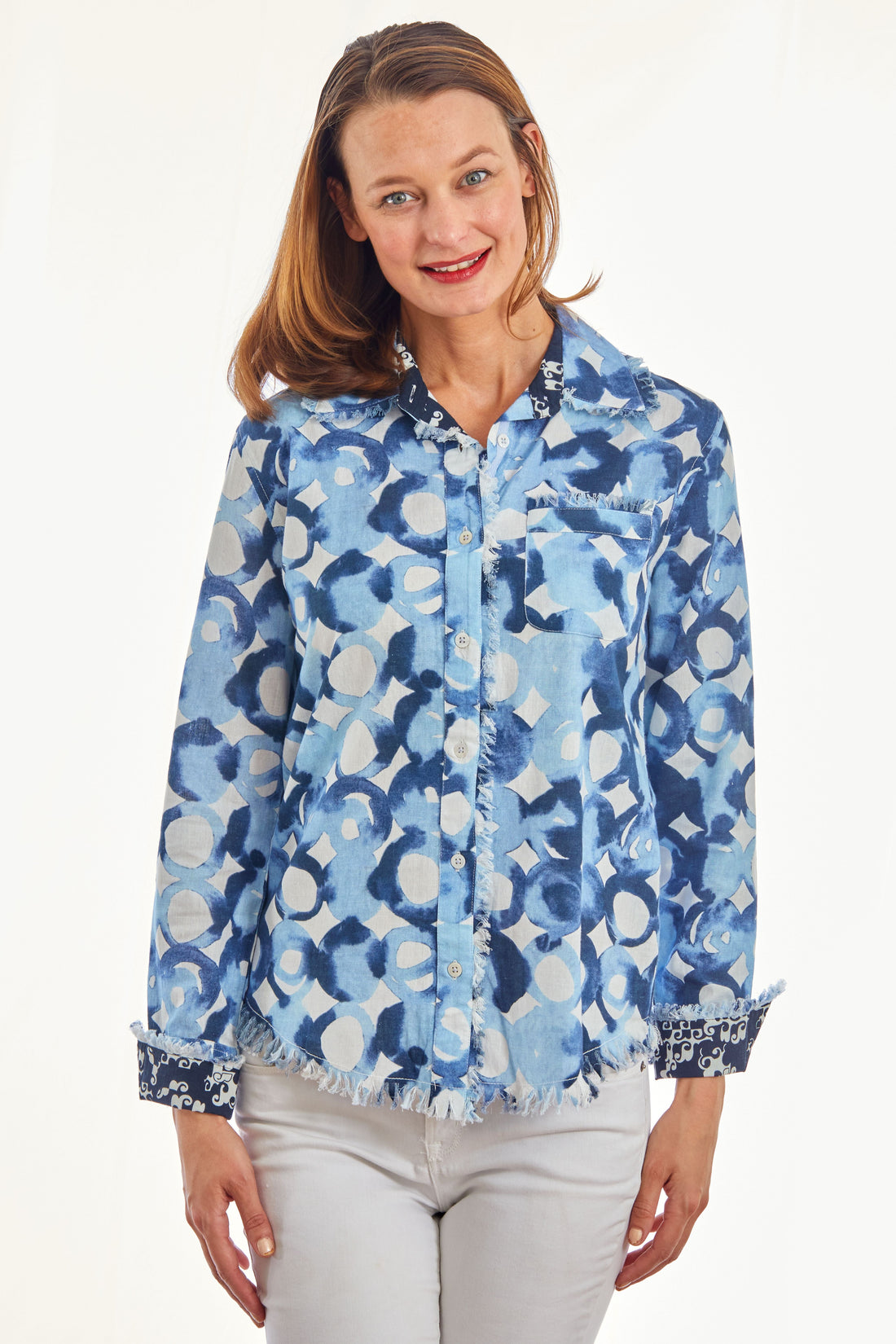 Dizzy-Lizzie Cape Cod Tunic in blues with watercolor print, lightweight casual tunic for women, shown on a hanger.
