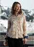 Dizzy-Lizzie Cape Cod Leopard Tunic featuring a leopard print fabric, long sleeves, and a relaxed fit.