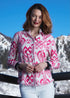 Pink and white Ikat print Cape Cod Tunic by Dizzy-Lizzie, featuring a relaxed fit and stylish design, displayed on a hanger.