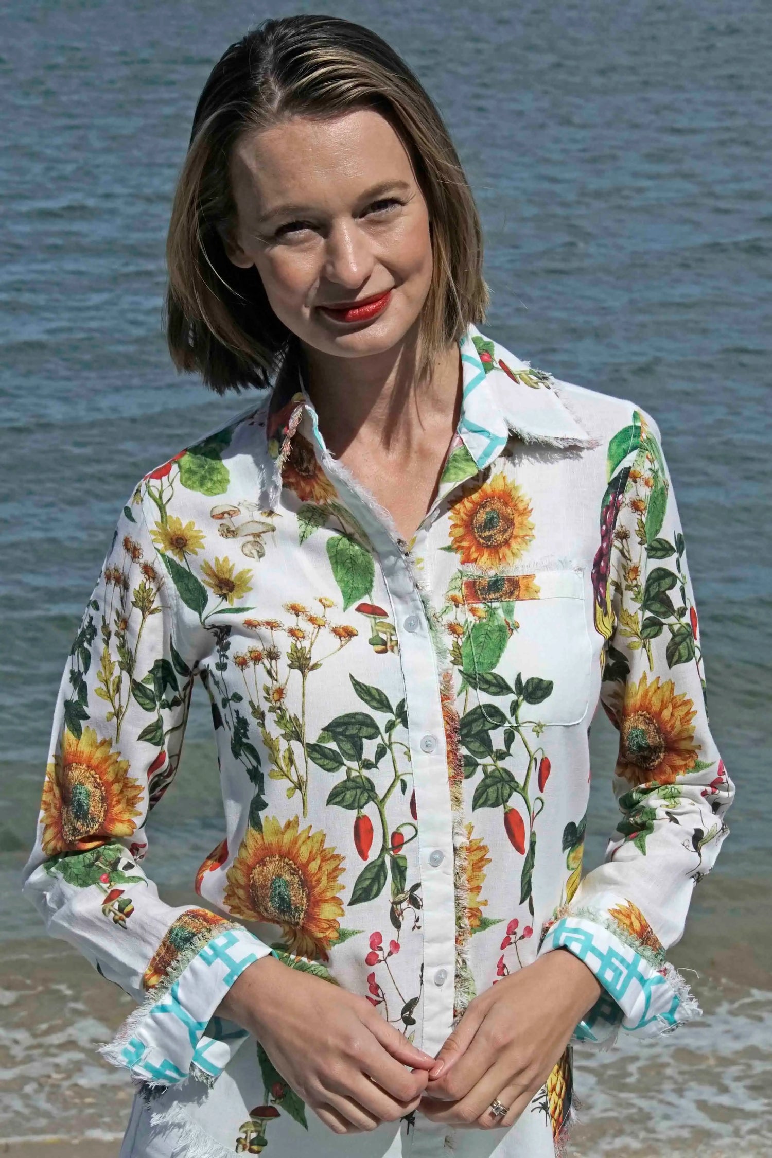 Dizzy-Lizzie Cape Cod Tunic with sunflower print, lightweight fabric, and relaxed fit, perfect for casual summer wear.