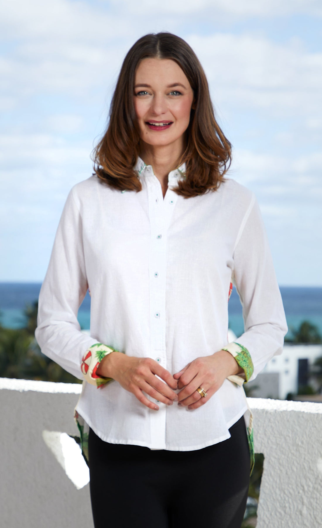 Dizzy-Lizzie Chesapeake Hi-Lo Tunic in Swimmers Print, lightweight sleeveless tunic with a relaxed fit and vibrant aquatic pattern.