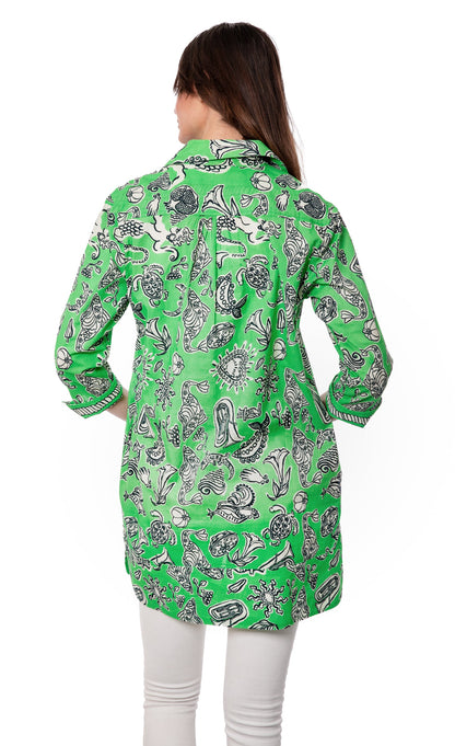 Green Vail Tunic by Dizzy-Lizzie with whimsical print, lightweight fabric, and relaxed fit, perfect for casual wear.