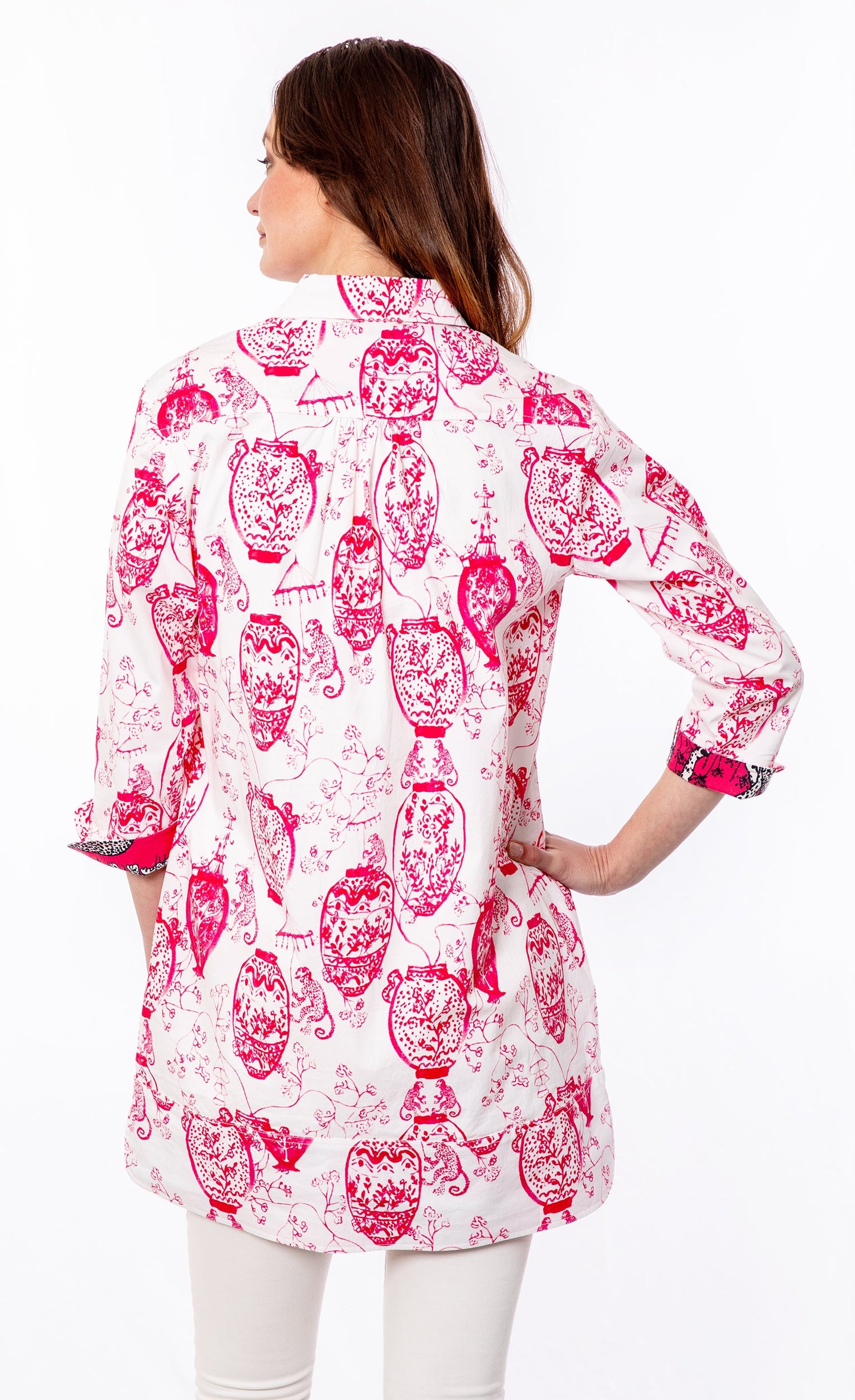 Pink and white Chinoiserie Vail tunic by Dizzy-Lizzie featuring intricate patterns and a relaxed fit.