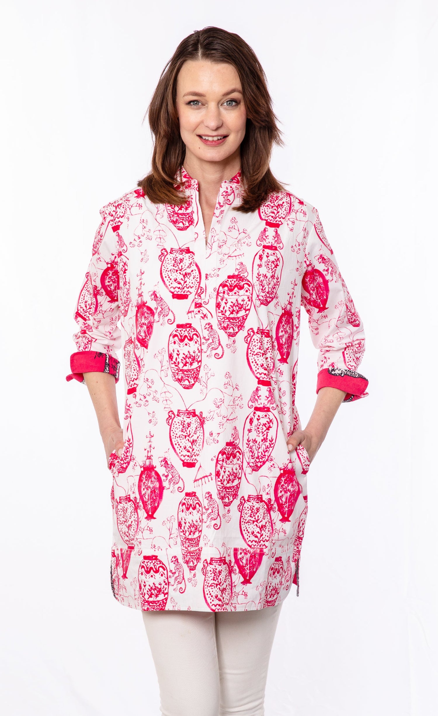 Pink and white Vail Tunic by Dizzy-Lizzie featuring a chinoiserie pattern, displayed on a neutral background.