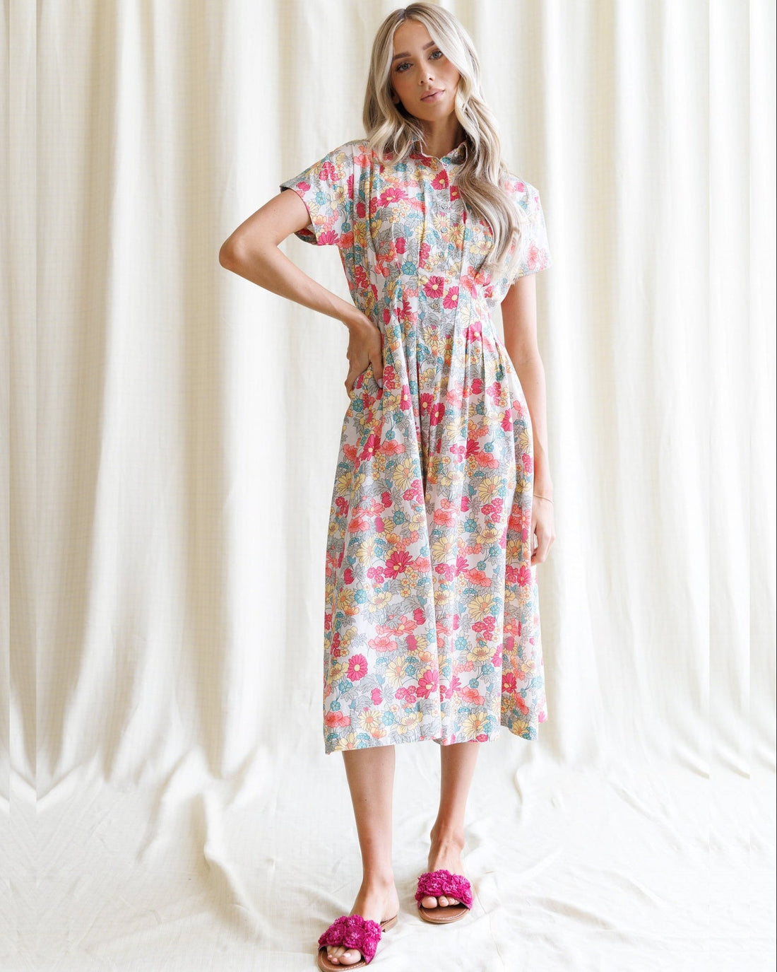 Downeast pleated shirtdress with long sleeves and button-front design, featuring a relaxed fit and classic style.