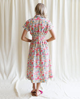 Downeast pleated shirtdress featuring a button-up front, long sleeves, and a flowy, knee-length design perfect for casual wear.