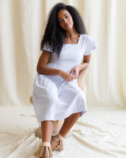 Downeast countryside dress with floral print, flowing fabric, and sleeveless design, perfect for casual summer wear.