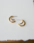 Downeast double hoop earrings with shiny silver finish, featuring two interconnected hoop designs on a white background.