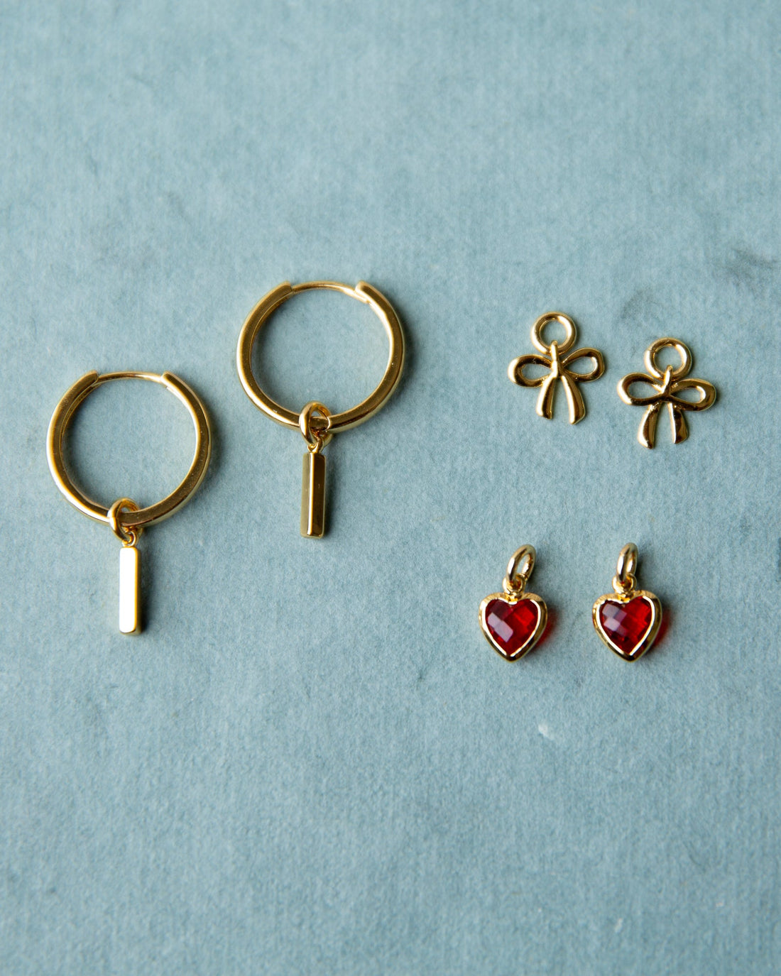 Downeast summer mix and match earring set featuring various colorful earrings on display.