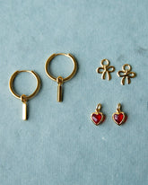 Downeast summer mix and match earring set featuring various colorful earrings on display.