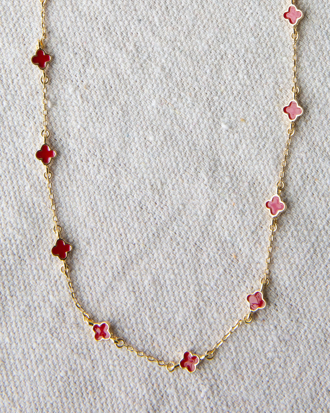 Downeast Lucky Me necklace featuring a delicate chain with a small, engraved pendant on a neutral background.