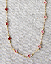 Downeast Lucky Me necklace featuring a delicate chain with a small, engraved pendant on a neutral background.