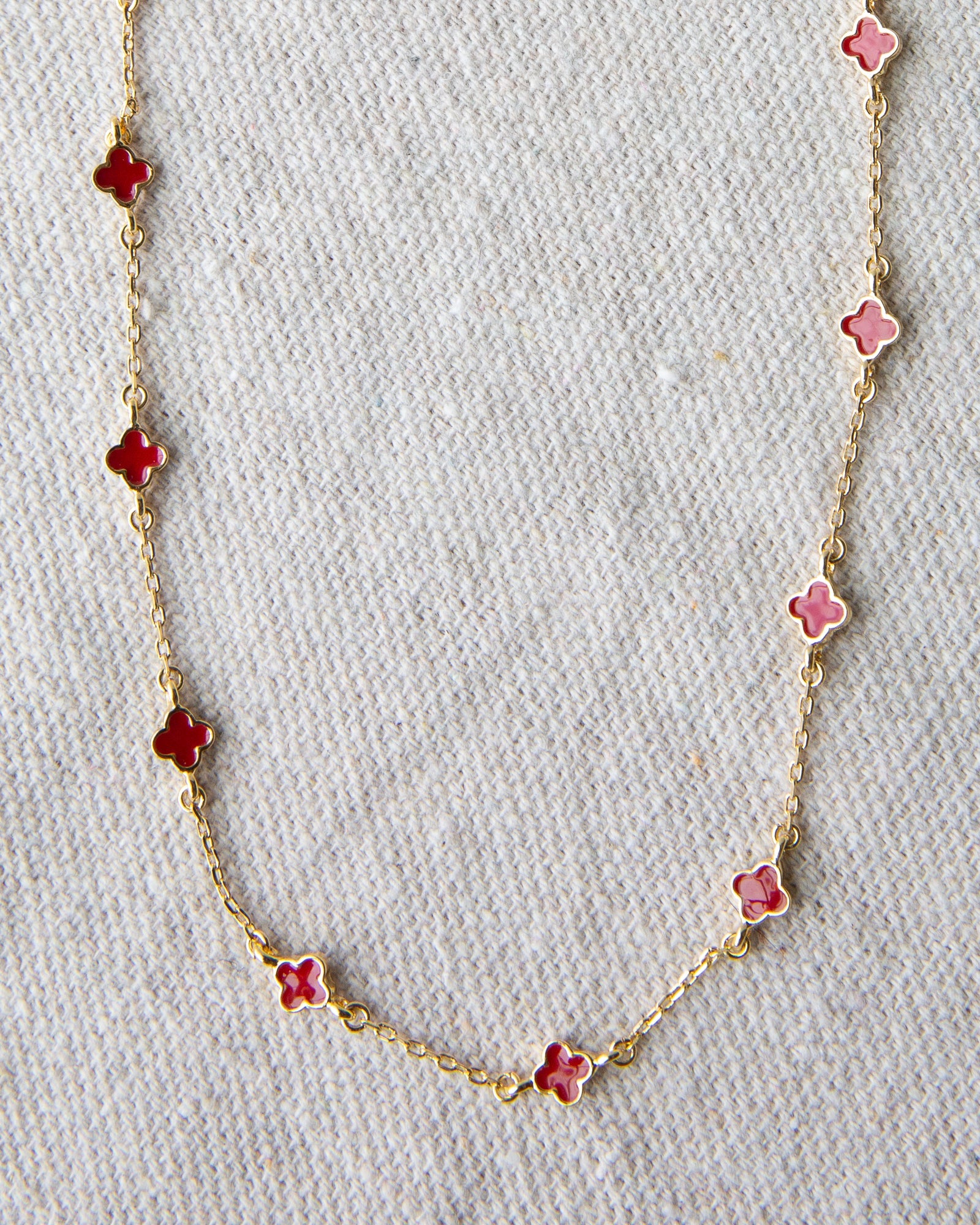 Downeast Lucky Me necklace featuring a delicate chain with a small, engraved pendant on a neutral background.