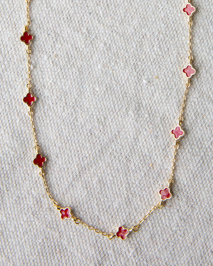 Downeast Lucky Me necklace featuring a delicate chain with a small, engraved pendant on a neutral background.