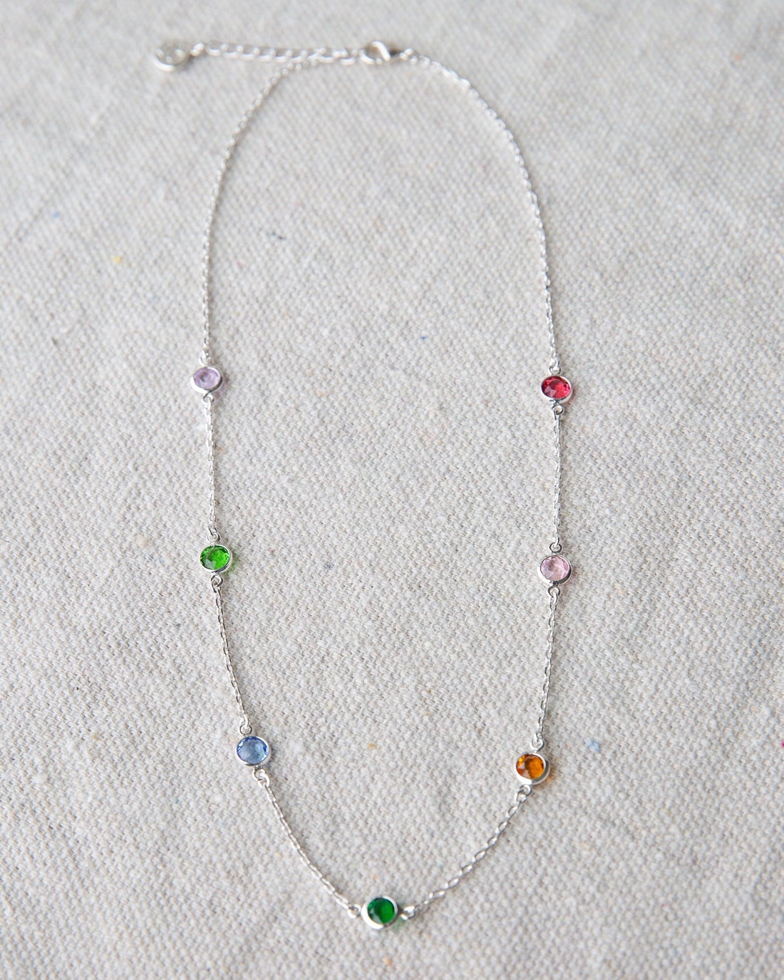 Silver Pop of Color Necklace by Downeast featuring vibrant, colorful beads on a sleek silver chain.