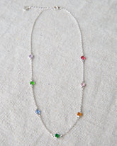 Silver Pop of Color Necklace by Downeast featuring vibrant, colorful beads on a sleek silver chain.