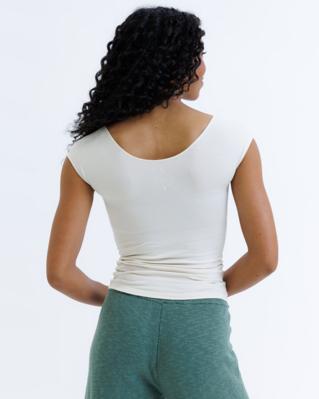 White Downeast Essential Tee, a casual crewneck t-shirt in XS, shown laid flat with soft cotton fabric details.
