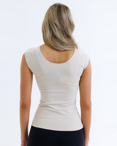 White Downeast Essential Tee displayed on a hanger, showcasing a classic crew neck design perfect for casual wear.