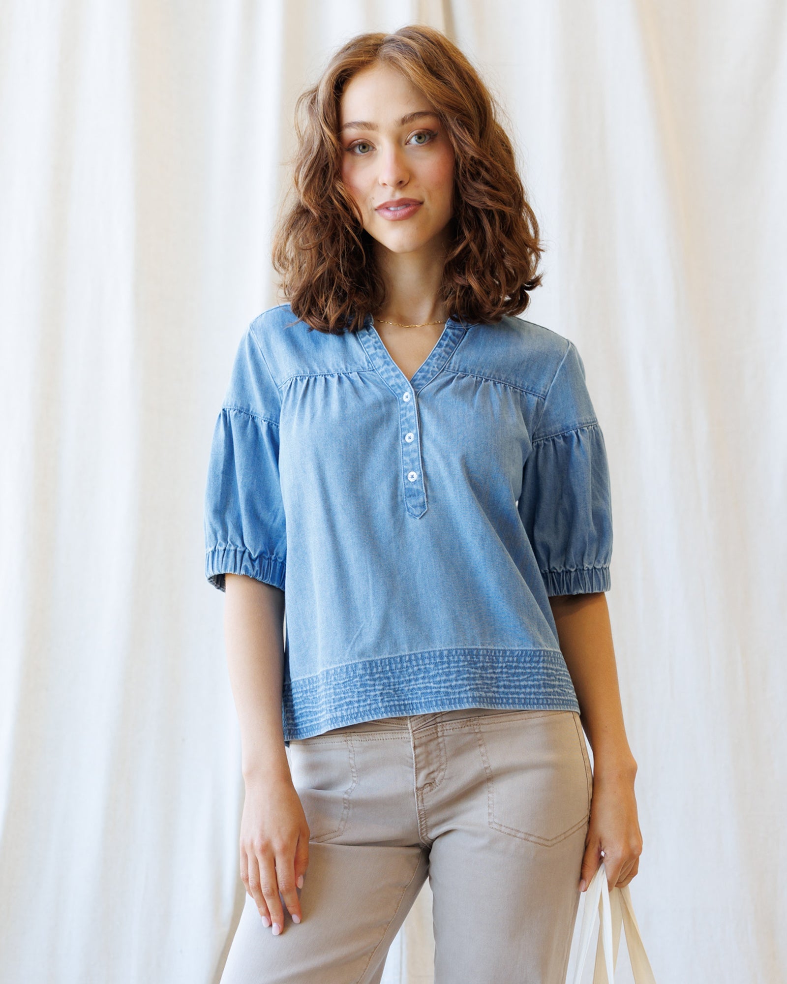 Downeast Portside Chambray Popover top with long sleeves and button details, casual and stylish for everyday wear.