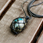 Conscious Items Dragon’s Heart Transformation Pendant necklace featuring a detailed dragon heart design on a silver chain.