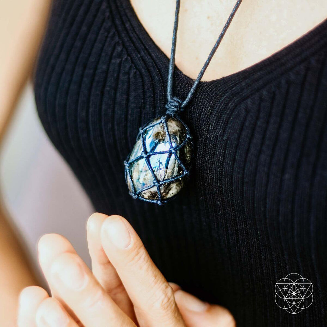 Conscious Items Dragon’s Heart Transformation Pendant necklace with a detailed dragon heart charm on a chain.