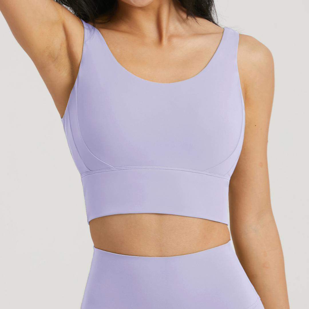 BLACKOUT BARBELL Omni Bra in periwinkle color, featuring soft fabric, supportive design, and stylish fit for everyday wear.