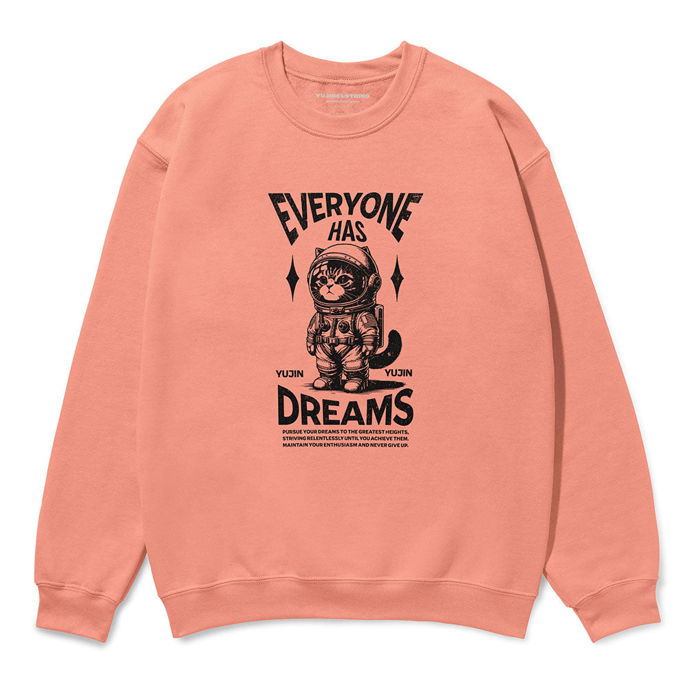 Yūjin Clothing Dream Big Cat sweatshirt showcasing a plush fabric with a large cat graphic and inspiring, motivational text.