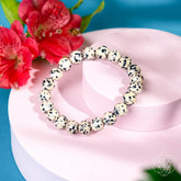 Dalmatian Jasper bracelet from Conscious Items featuring natural stone beads with black and white spotted pattern.