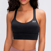 Blackout Barbell Ryla Bra shown on a mannequin, featuring a stylish black design and supportive fit.