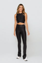 Black leather-look crossover crop top from Fitkitty Culture Athleisure Wear, featuring a stylish, fitted design for women&