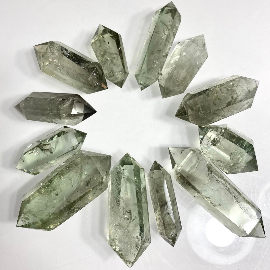 Prasiolite Green Amethyst double terminated crystal point from Evermore Everlasting, showcasing a polished, natural gemstone with pointed ends.