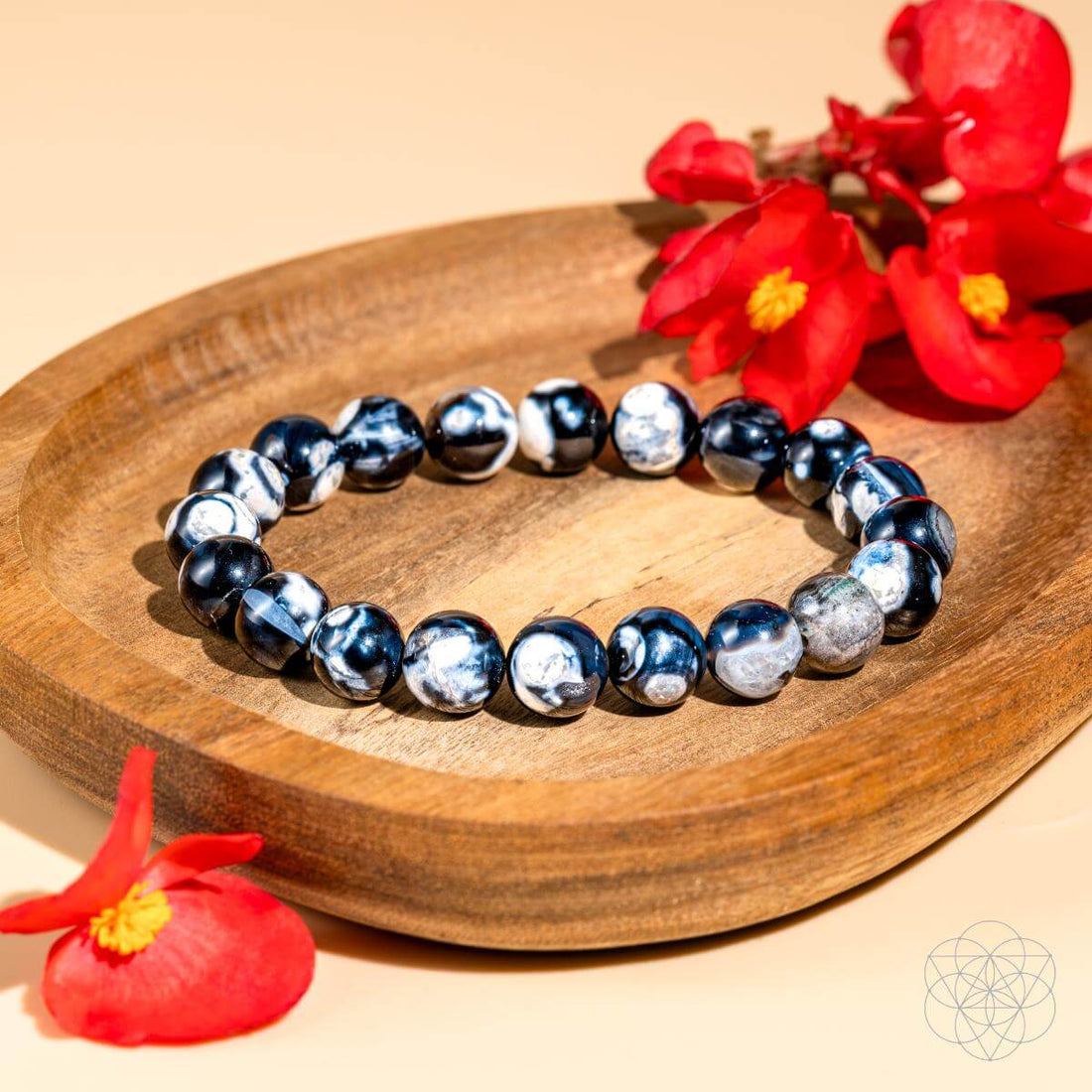 Exotic Orca Agate bracelet from Conscious Items featuring deep healing properties and polished, natural stone beads.