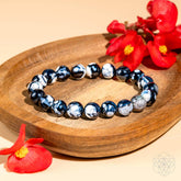 Exotic Orca Agate bracelet from Conscious Items featuring deep healing properties and polished, natural stone beads.