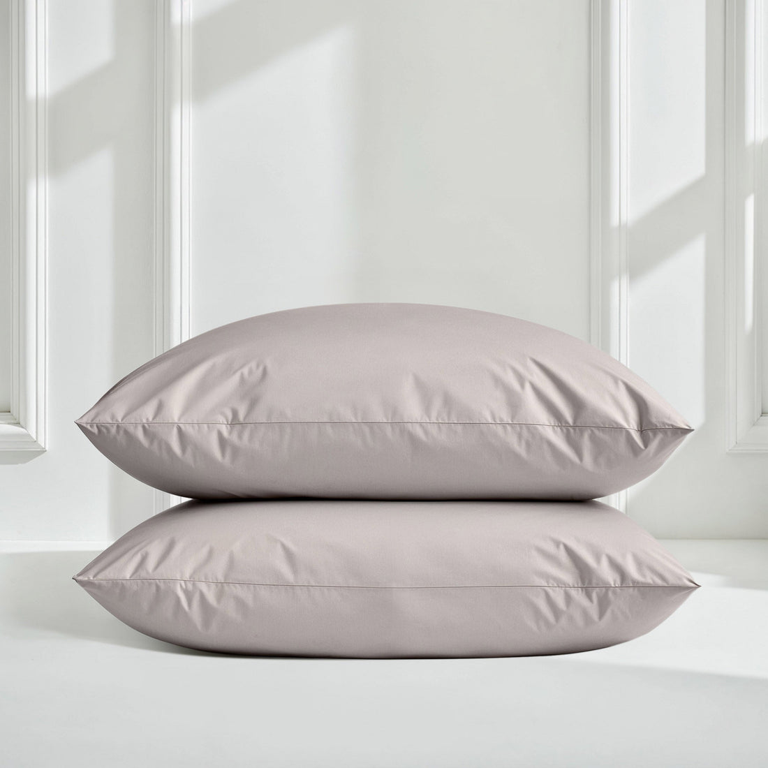 Elegant Luxe Australian Sateen Pillowcase Set by Italic, soft smooth bed pillowcases on a neatly made bed.