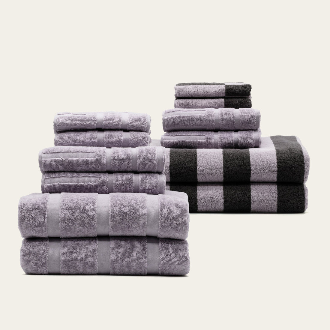 Family set of Italic Capri Australian Cotton Bath Towels, soft and plush for home use, displayed in a cozy bathroom setting.
