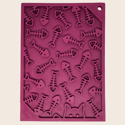 Maroon Farm To Pet lick mat with fishbone pattern for cats and small dogs, featuring textured surface for engaging pet play.