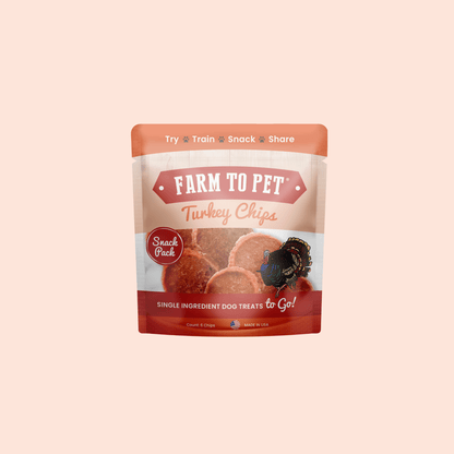Farm To Pet turkey chips snack pack with low allergen dog treats, showing crispy, bite-sized pieces in a clear package.