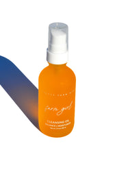 Pretty Farm Girl cleansing oil face cleanser with natural ingredients, gentle for all skin types, in a clear bottle.