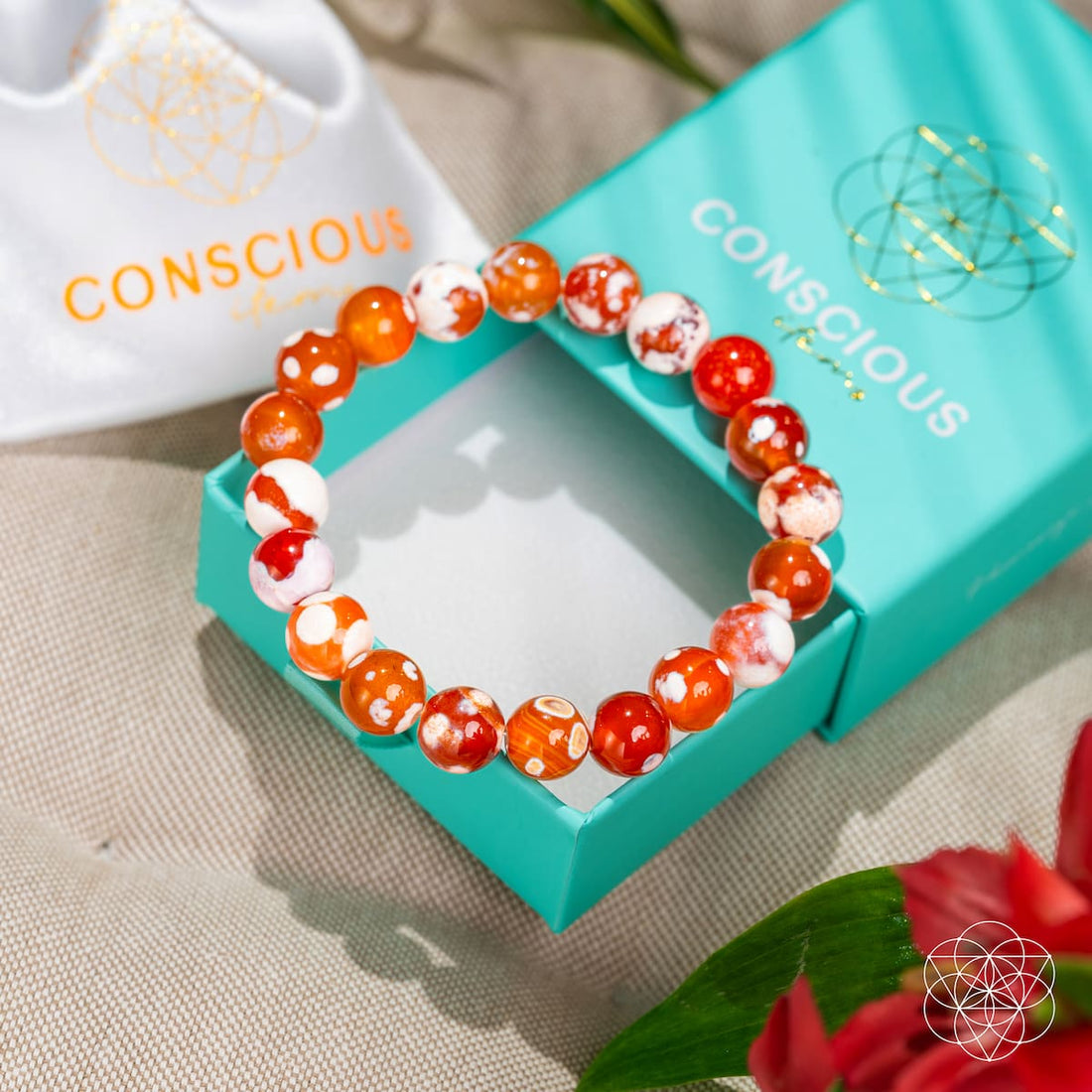Feminine Force Carnelian Orca Agate bracelet by Conscious Items featuring vibrant orange agate beads and intricate design.