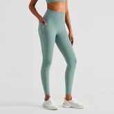 Seafoam green Koa Leggings by BLACKOUT BARBELL, featuring a snug fit and high-waist design for active wear and comfort.