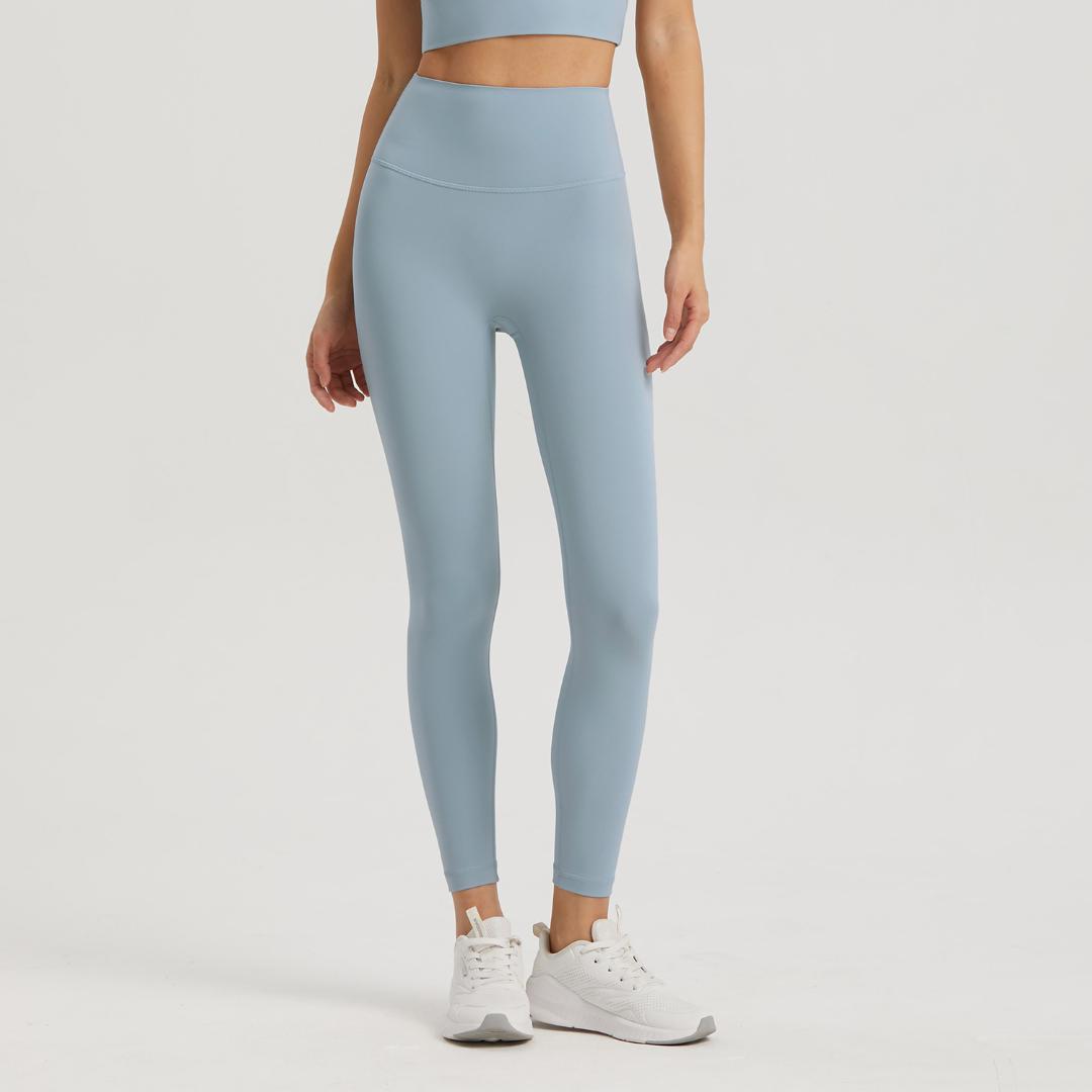 Blackout Barbell Omni Legging in Cloudy Blue, close-up of high-waisted athletic leggings with seamless design and stretchy fabric.