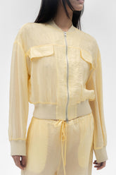 Findmenowthelabel Fabio voile jacket in butter, showcasing lightweight fabric and stylish design on a model.
