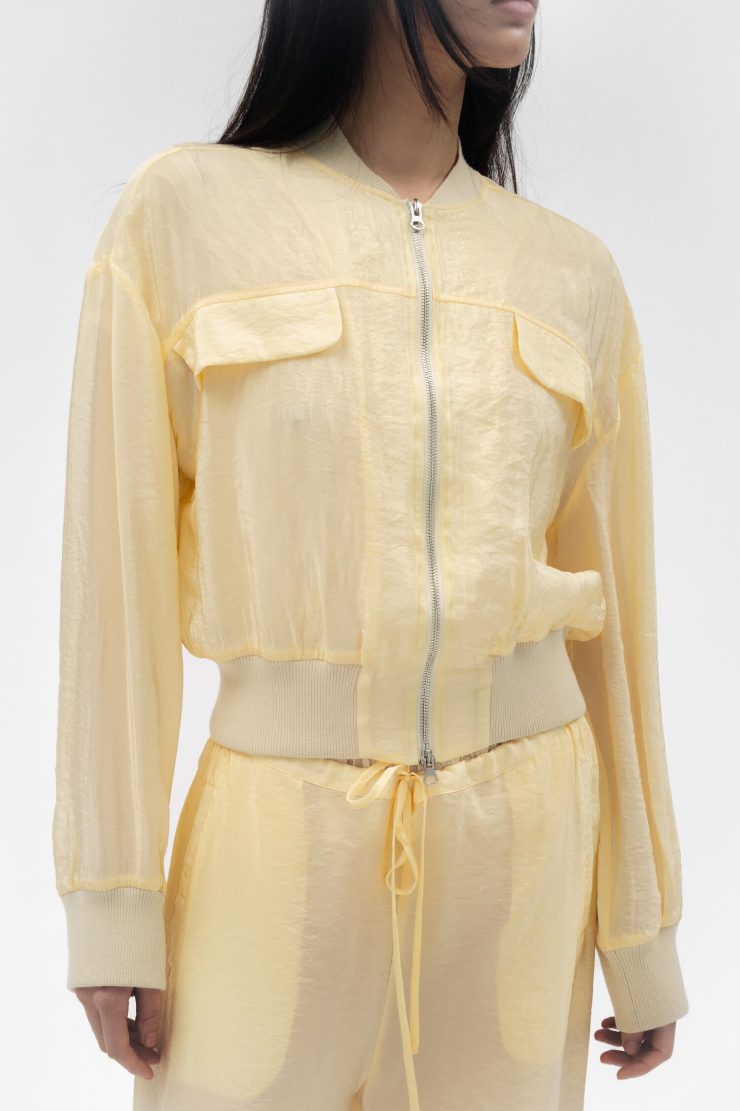 Findmenowthelabel Fabio voile jacket in butter, showcasing lightweight fabric and stylish design on a model.