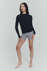 Navy ribbed knit cardigan from findmenowthelabel featuring a cozy, textured knitwear design and button-up front.