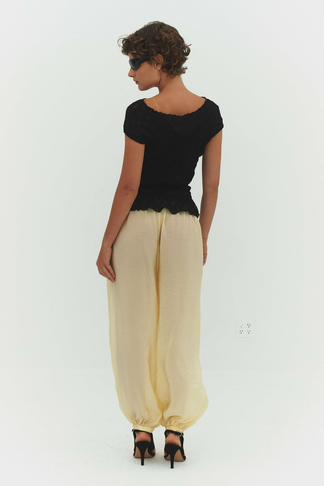 FindmeNowTheLabel ZORA voile pants in butter color, lightweight and flowy fabric, shown from front with relaxed fit and soft draping.