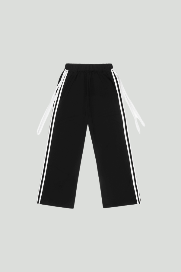 Black French Terry Bow Jogger pants by findmenowthelabel featuring a relaxed fit and elastic waistband.