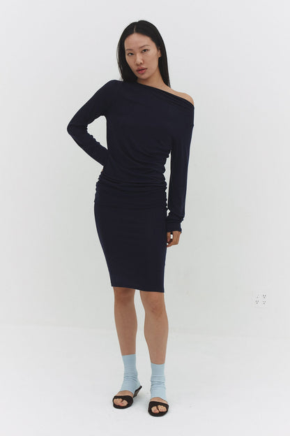 Narae long sleeve navy T-shirt by findmenowthelabel, featuring a fitted design and soft fabric, shown on a hanger against a plain background.
